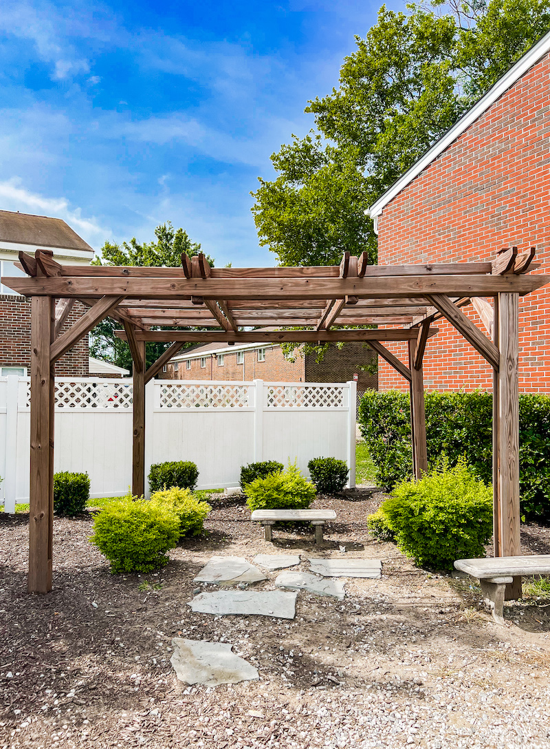 pergola with small bench underneath